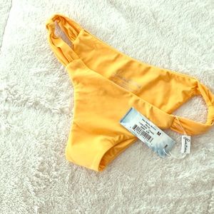 - Malibu Bottom in mango from Frankie’s Bikinis